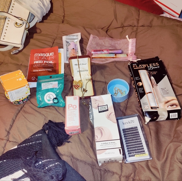Hugh Lots of makeup/skincare new + beautiful jewelry